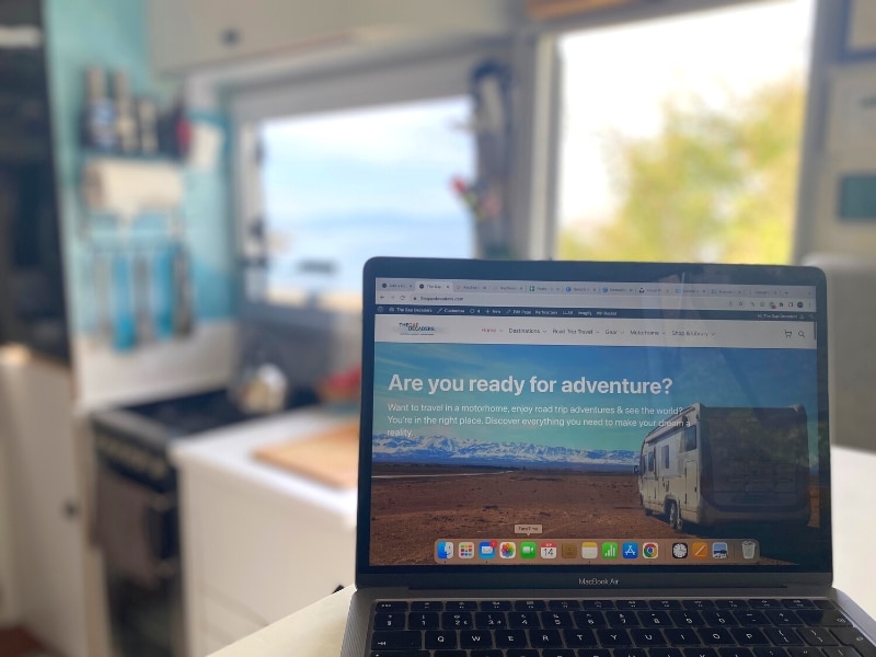 open laptop on a table in a motorhome