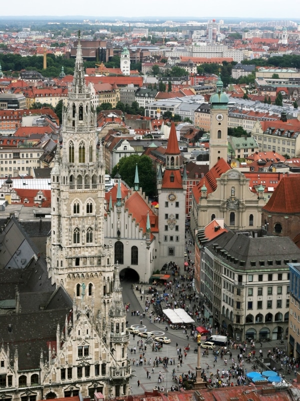 town square flanked by an ornate church and several other creamy coloured buildings