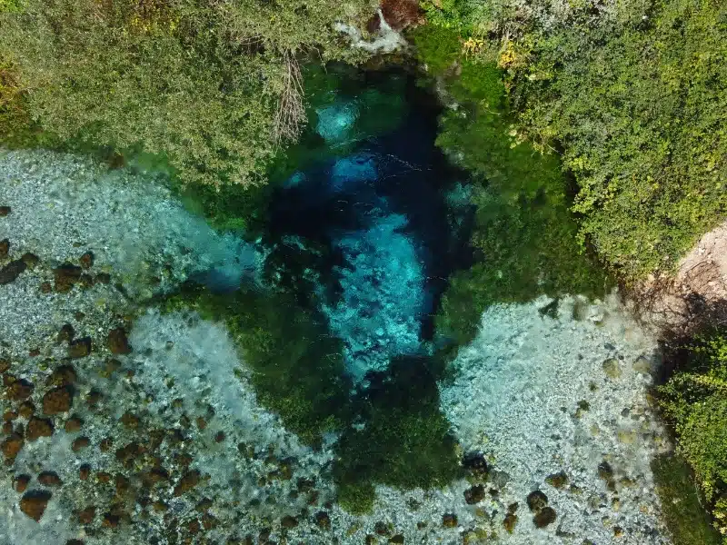 Bird's eye view of a natural karst spring taken by drone