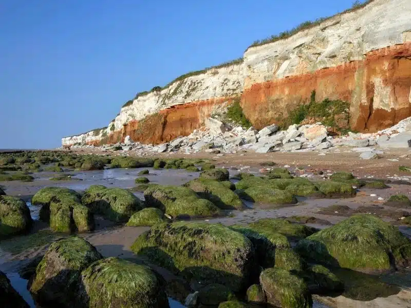Hunstanton beach backed by red and white stripey cliffs