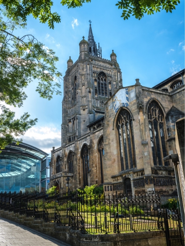 city centre church with contemporary building in the background