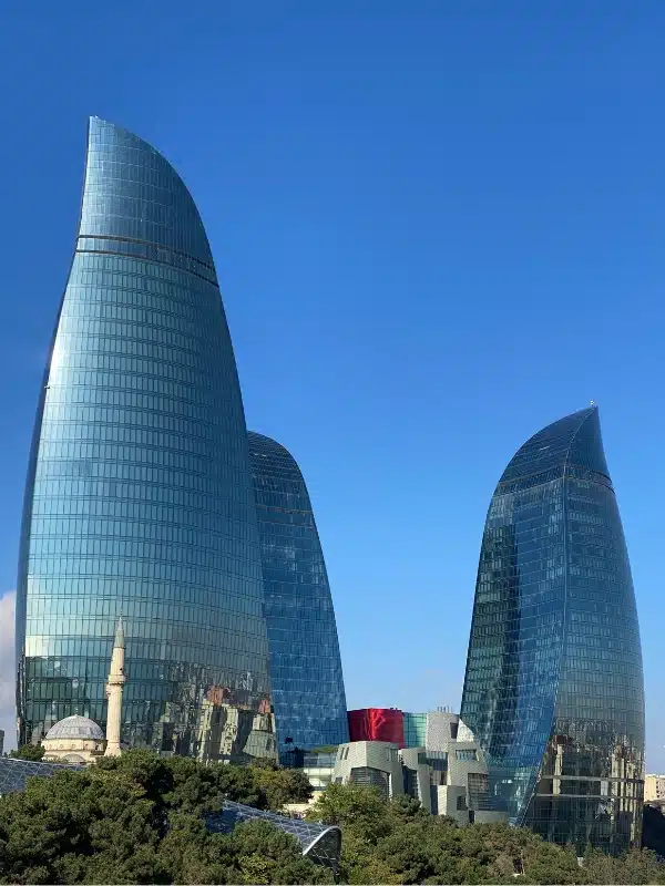 trio of flame shaped glass skyscrapers 