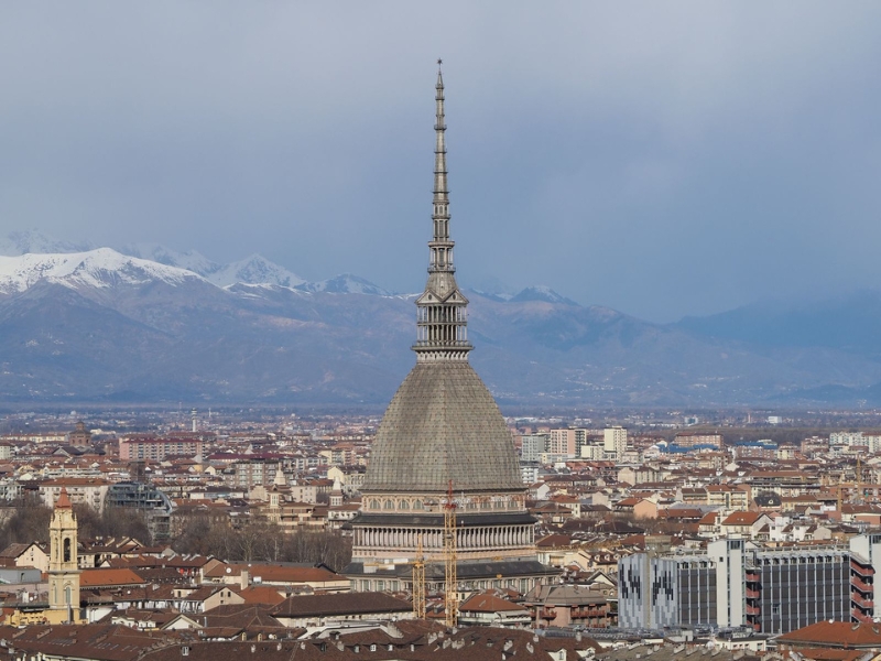 Turin Cathedral spire with the Alps in the distance