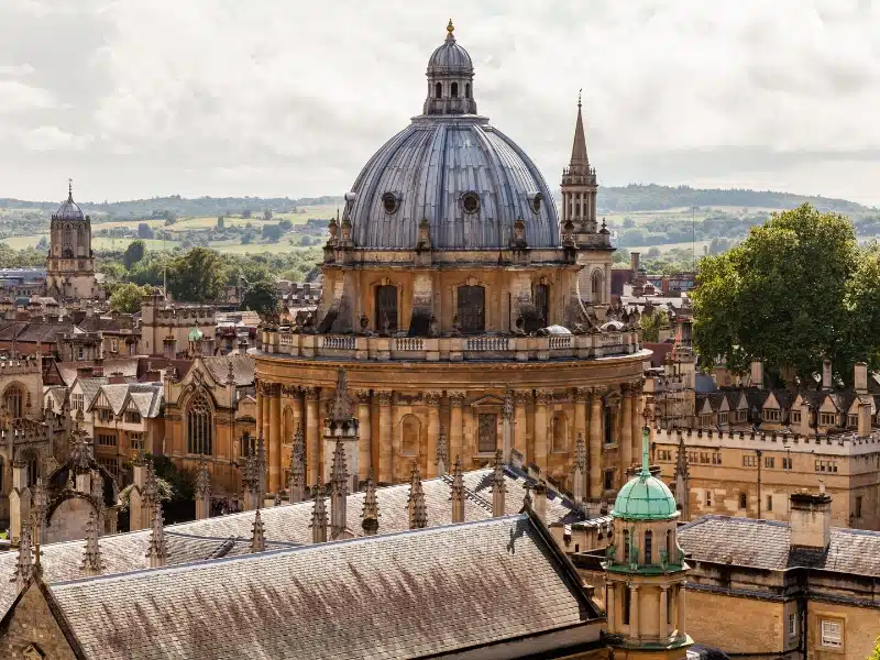 Oxford city skyline with Radcliffe Camera and the countryside of Boars Hill in the distance