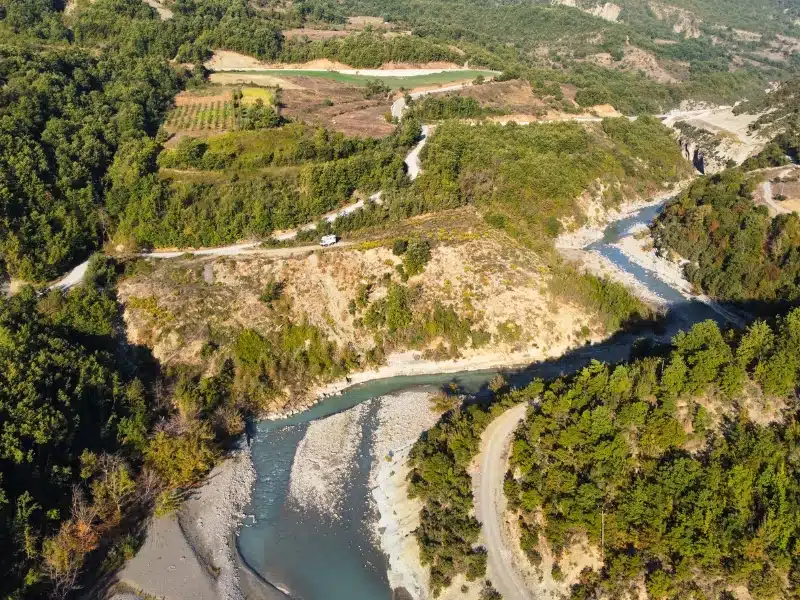 river canyon surrouned by wooded landscape