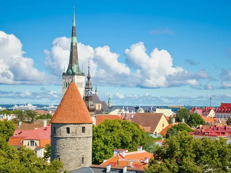 Panoramic view of Old Town of Tallinn with traditional red tile roofs, medieval churches, towers and walls, from Patkuli Vaateplatvorm Toompea Hill, Estonia