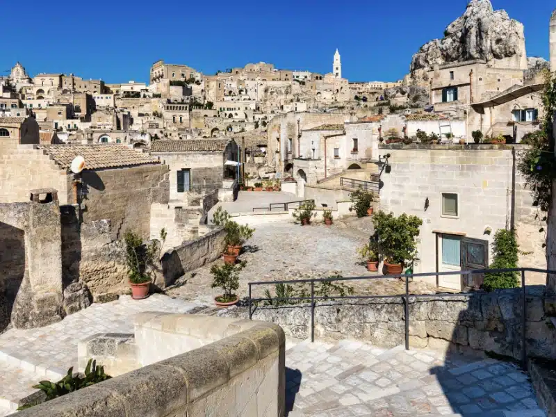 Panoramic view of the ancient town of Matera (Sassi di Matera) in a beautiful autumn day, Basilicata, southern Italy. Stunning view of the village of Matera. Matera is a city on a rocky outcrop.