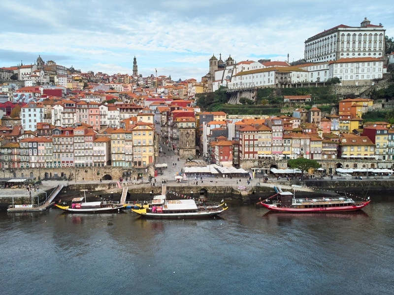 Aerial view of the old city of Porto. Portugal old town ribeira aerial promenade view with colorful houses. 