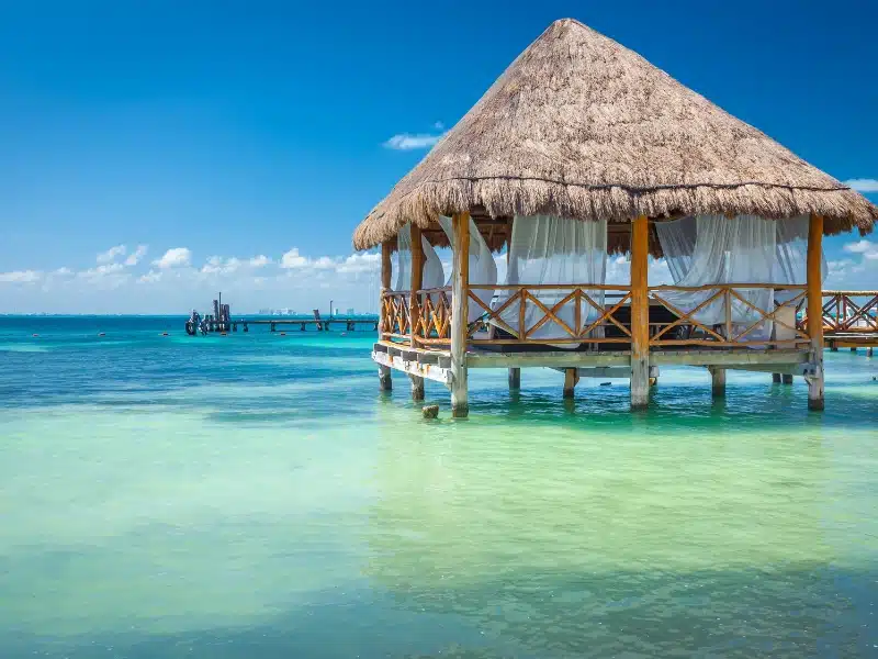 Cancun idyllic caribbean beach and gazebo rustic Palapa, Riviera Maya, Mexico