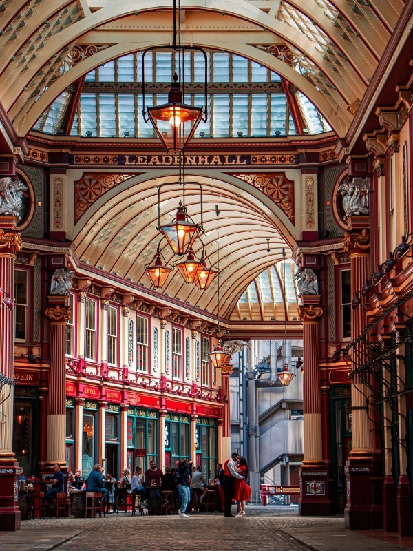 Ornate cobbled Victorian market hall with glass roof