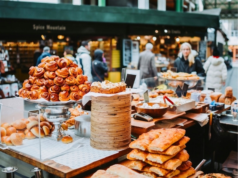 Table in a London market displaying food for sale