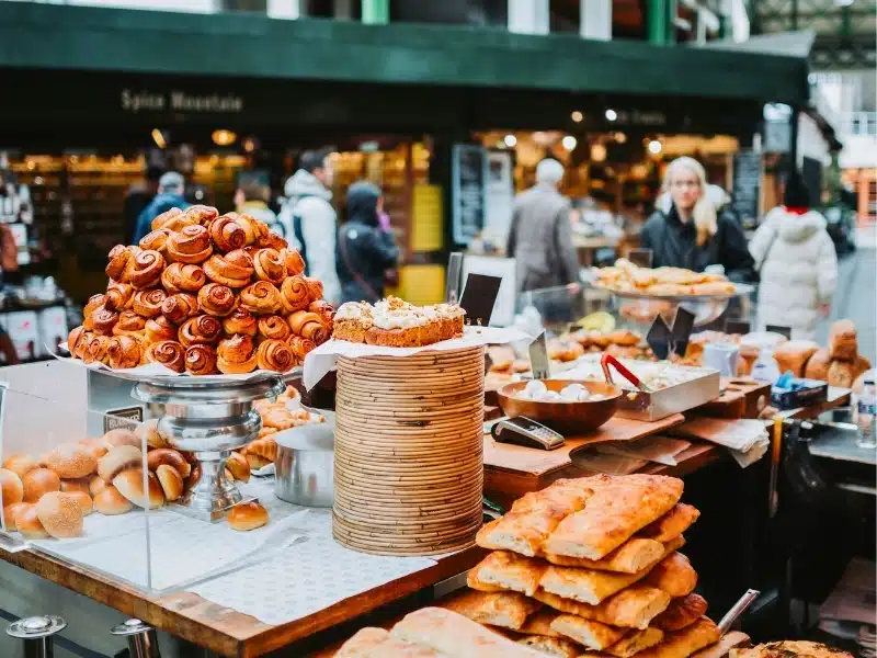 Table in a London market displaying food for sale