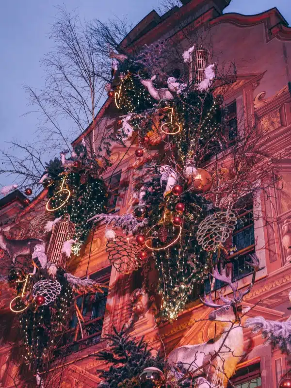Historic house festooned with elaborate Christmas decorations