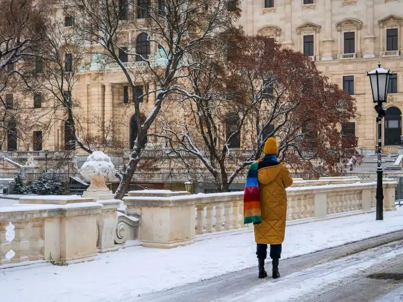 Woman on a snow covered road in Vienna Austria