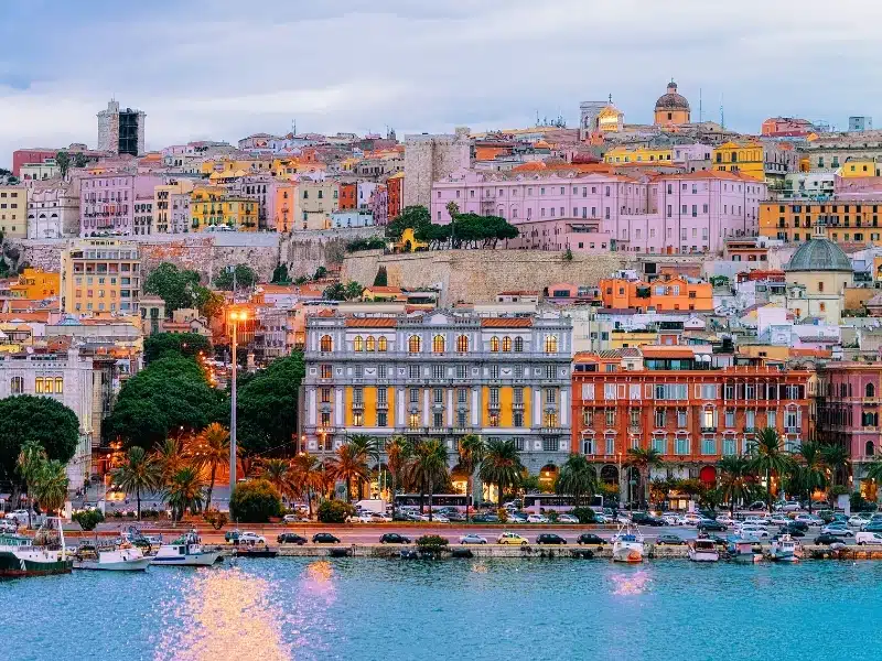 Cityscape with marina in the Mediterranian sea in the evening, Cagliari, Sardinia, Italy