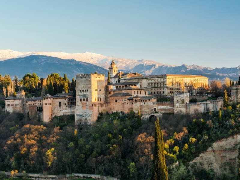 Alhambra palace in Granada,Spain with Sierra Nevada mountains in back.