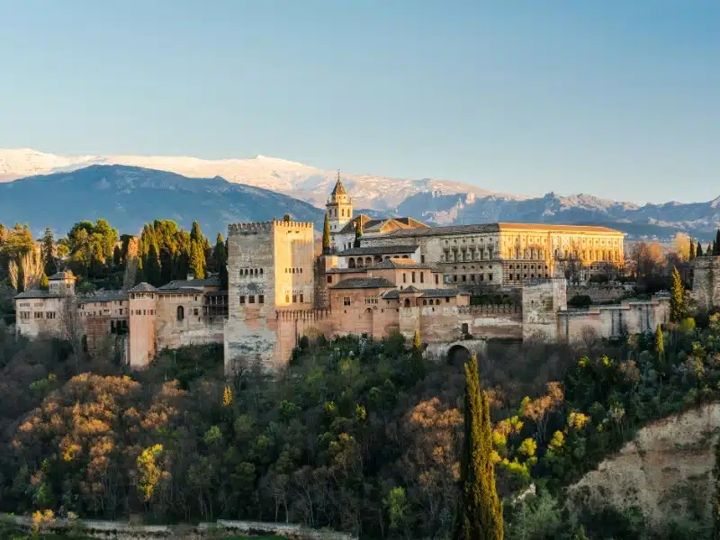 Alhambra palace in Granada,Spain with Sierra Nevada mountains in back.