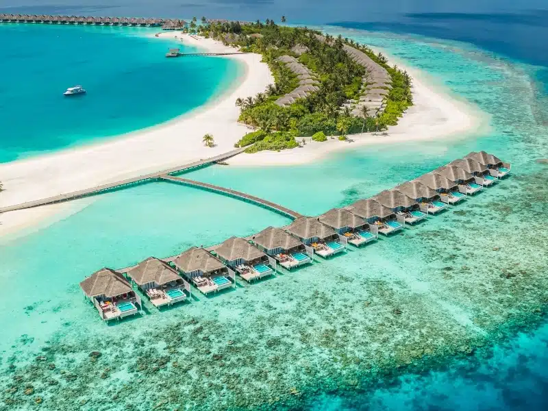 Perfect Maldives paradise scene. Tropical aerial landscape, seascape, luxury water villas. Amazing sea sky, reef lagoon beach picturesque nature. 