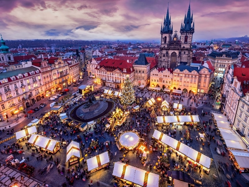 Elevated view of the old town square of Prague, Czech Republic, during winter time with the traditional Christmas Market for the festive season