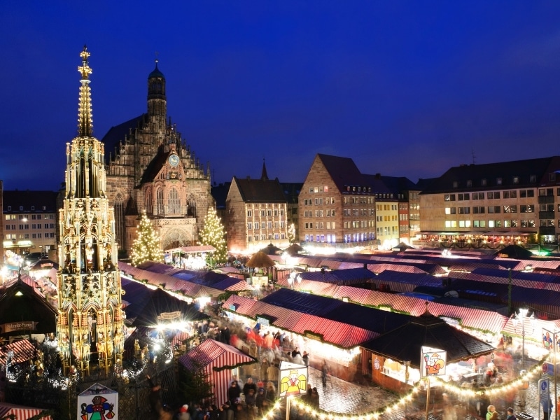 Christkindlesmarkt at dusk in Nuremberg, Bavaria, Germany. It is one of the large christmas markets in Germany.