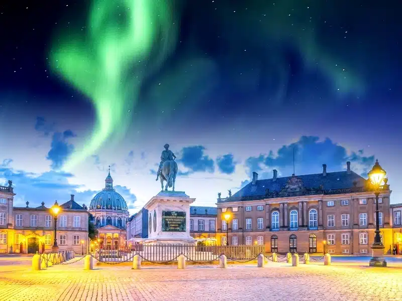 Amalienborg Palace in Copenhagen, Denmark with the Northern Lights on display