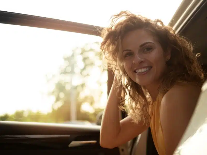 woman travelling with her car