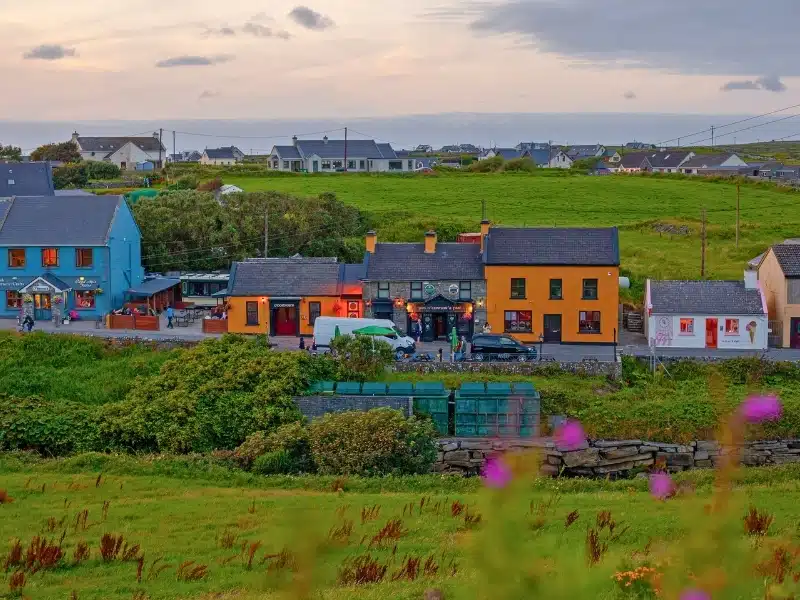Panoramic view of the old village of Doolin with the traditional colorful cottages in County Clare Ireland.