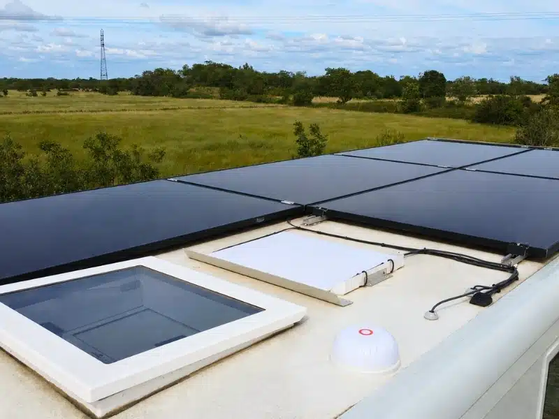Truck roof showing solar panels, starlink and a mimo antenna