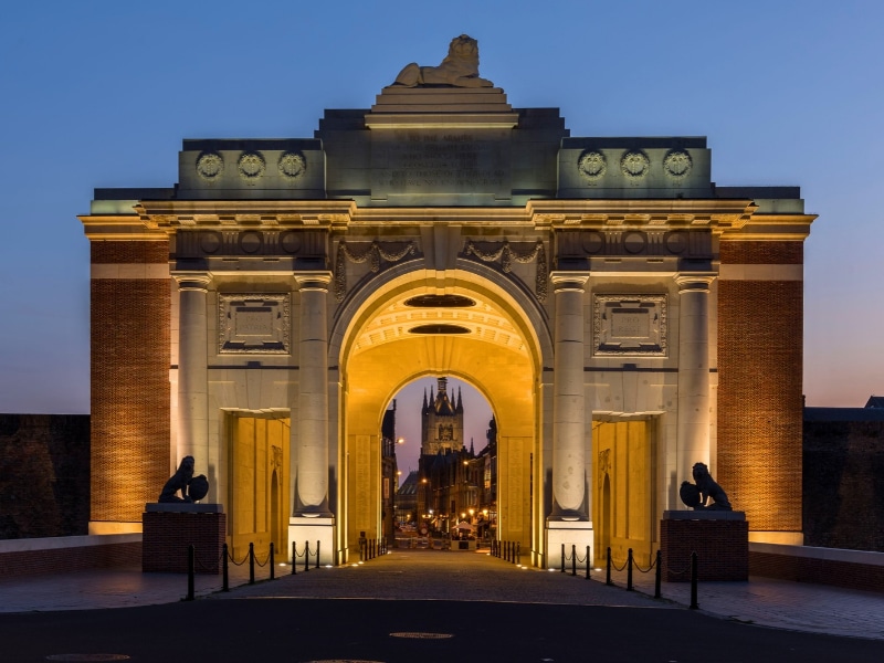 The Menin Gate illuminated in the dark in Ypres, Belgium