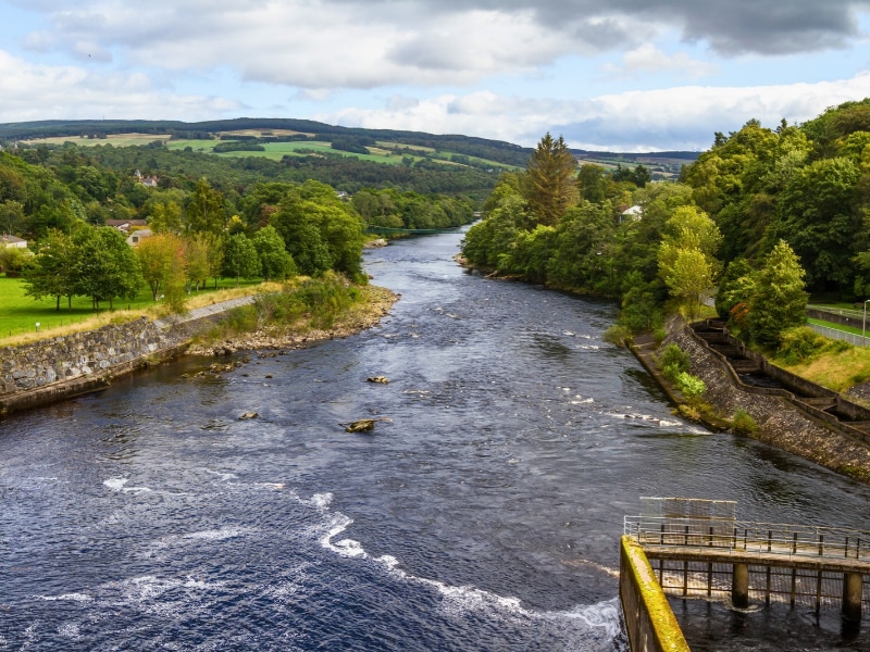 Landscape view of the Pitlochry dam and river Tummel in the Scottish Highlands