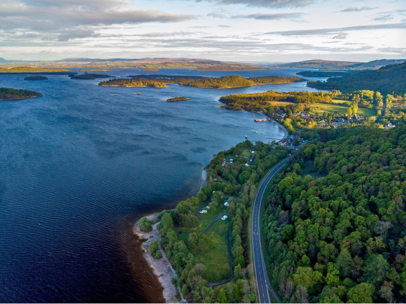 the A82 road heading north past Loch Lomond and Luss