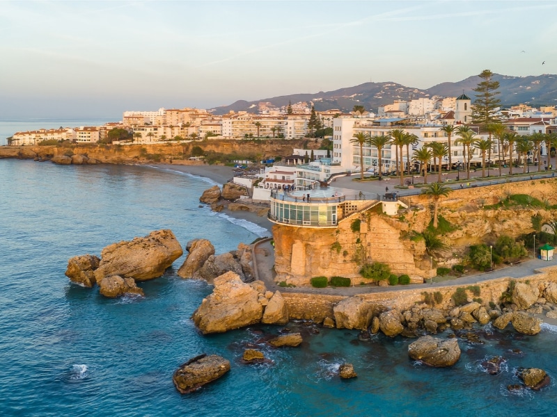 Aerial view of the famous mirador view point Balcon de Europa in Nerja resort town on Costa del Sol Mediterranean sea coast at sunrise in Andalusia, Spain