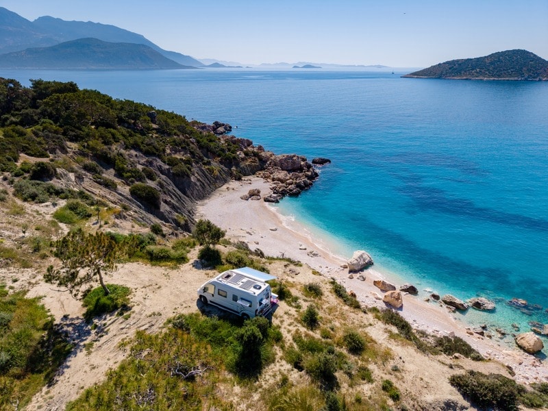 Camperamong lush greenery and crystal-clear waters